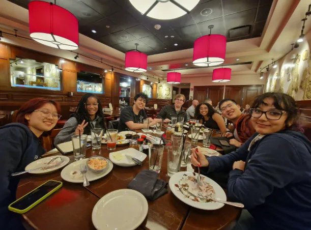 The PacBot team having dinner together after the competition